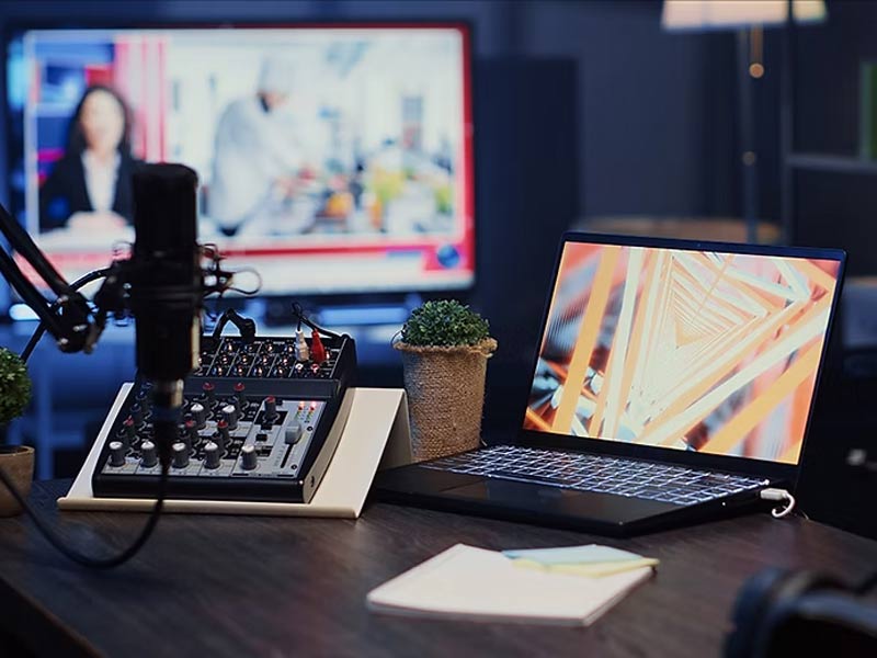 Recording section with mike and laptop