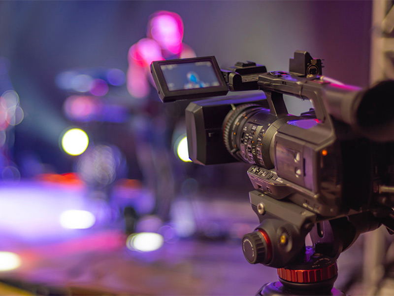 Professional video camera recording a live event.